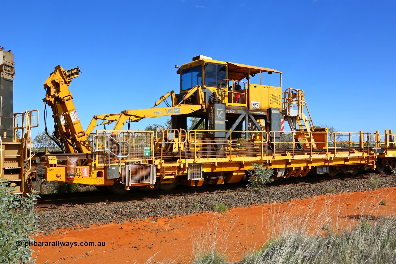 180614 1342
Goldsworthy Junction, Lead-Off Lead-On waggon STTR class STTR 6214 on the end of the Steel Train or rail recovery and transport train, built by Gemco Rail WA, the chutes can be seen standing up with the squeeze rollers, the straddle crane SD 1 is a new unit built by Vaia Car model no. TCR-V. [url=https://goo.gl/maps/uYkrn38PhF92]GeoData[/url]. 14th June 2018.
