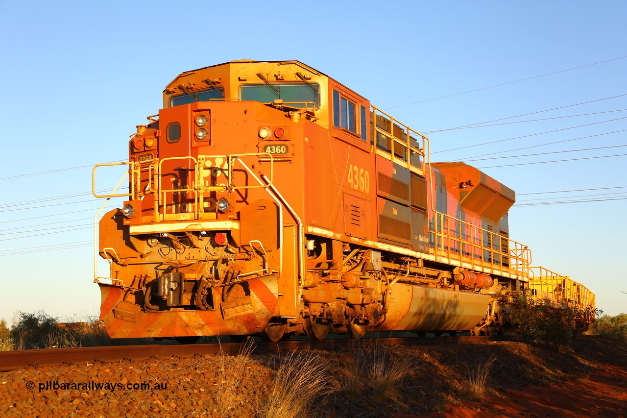 180615 1625
Goldsworthy Junction, BHP stabled rail or steel train holds the former Goldsworthy mainline between the junction and Node 1 due to upgrading track works within the flash butt yard behind Electro-Motive Diesel built SD70ACe 4360 serial 20098203-005 in late afternoon light. 15th June 2018. [url=https://goo.gl/maps/h8jiJjoQydk]GeoData[/url].
Photo by Roland Depth.
