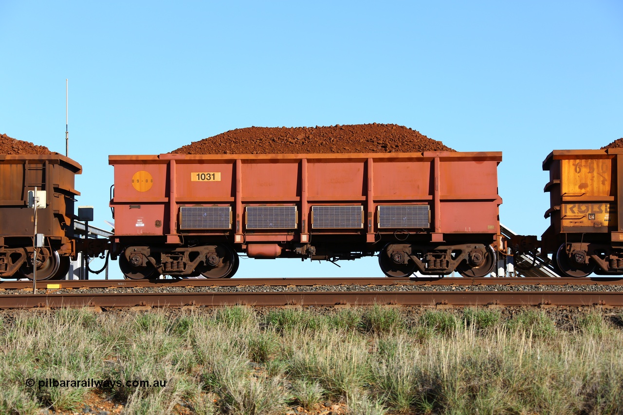 180616 1679
Cooya Pooya, instrumented ore waggon 1031, part of a second batch of extra 'J' waggons built by Bradken in September 2008 and painted rather than the plain steel finish. Solar panels adorn the waggon sides. 16th June 2018. [url=https://goo.gl/maps/PW31kLARES92]GeoData[/url].
Keywords: 1031;Bradken-NSW;