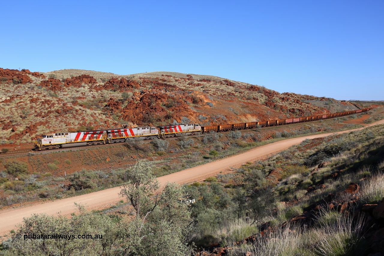 180616 1687
Cooya Pooya, an empty Robe Valley train with triple ES44ACi units on the lead, Rio Tinto loco 9109 with serial 62540 a GE Erie built GE model ES44ACi from the 2nd order in Rio Tinto Stripes livery leads sister General Electric built 9128 and 9106 all in Rio Tinto stripe livery with a load of 'J cars' at the 38 km, 16th June 2018. [url=https://goo.gl/maps/dRaSPJeJddq]GeoData[/url].
Keywords: 9109;62540;GE;ES44ACi;Rio-Tinto-Stripes;