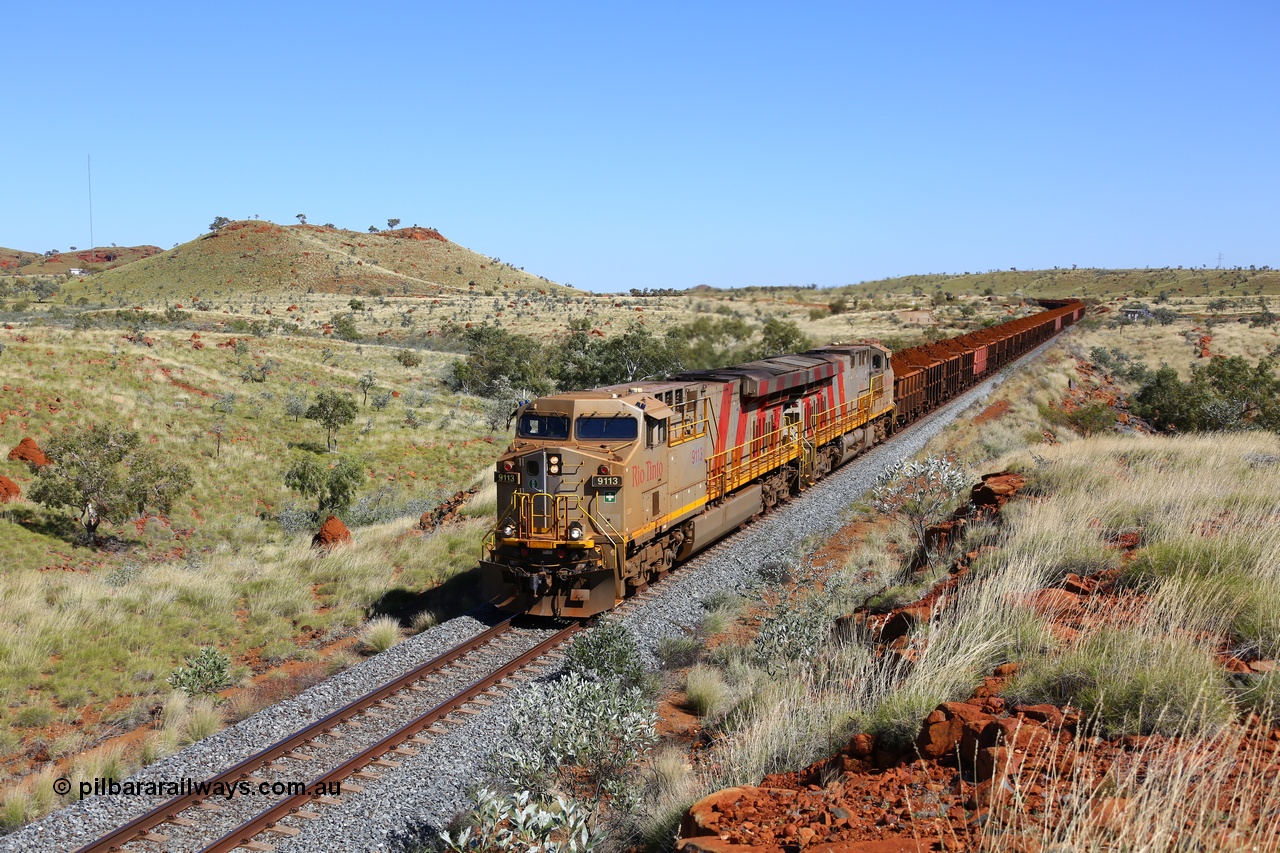 180616 1846
Maitland Siding, a loaded Mesa A train runs along the mainline behind the standard double General Electric ES44ACi units that operate the Robe Valley trains, Rio Tinto loco 9113 with serial 62544 a GE Erie built GE model ES44ACi from the 2nd order in Rio Tinto Stripes livery leads sister unit 9114 serial 62545 at the 96 km. 19th June 2018. [url=https://goo.gl/maps/7sNyPJJ9ZdQ2]GeoData[/url].
Keywords: 9113;62544;GE;ES44ACi;Rio-Tinto-Stripes;