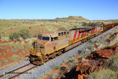 180616 1847
Maitland Siding, a loaded Mesa A train runs along the mainline behind the standard double General Electric ES44ACi units that operate the Robe Valley trains, Rio Tinto loco 9113 with serial 62544 a GE Erie built GE model ES44ACi from the 2nd order in Rio Tinto Stripes livery leads sister unit 9114 serial 62545 at the 96 km. 19th June 2018. [url=https://goo.gl/maps/7sNyPJJ9ZdQ2]GeoData[/url].
Keywords: 9113;GE;ES44ACi;62544;Rio-Tinto-Stripes;