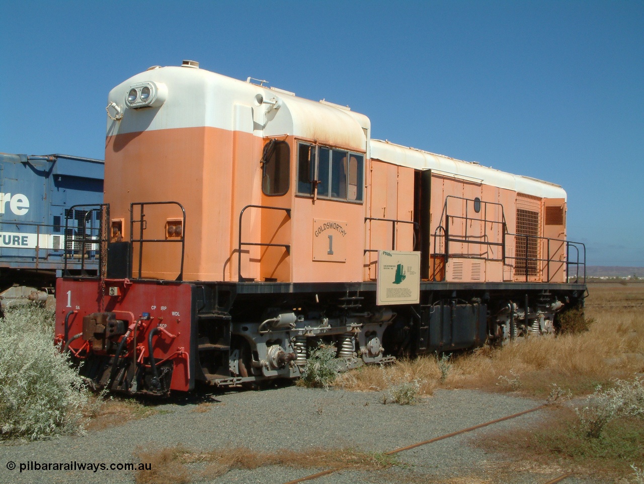 050109 092824
Pilbara Railways Historical Society, Goldsworthy Mining Ltd B class unit 1, an English Electric built ST95B model, originally built in 1965 serial A-104, due to accident damage rebuilt on new frame with serial A232 in 1970. These units of Bo-Bo design with a 6CSRKT 640kW prime mover and built at the Rocklea Qld plant. 9th October 2005.
Keywords: B-class;English-Electric-Qld;ST95B;A-104;A-232;GML;Goldsworthy-Mining;