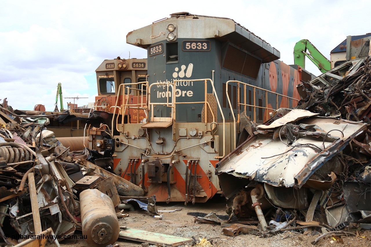 160128 00380
Wedgefield, Sims Metal yard, surrounded by remains, the last unit of 4 GE CM39-8 units built new in 1988 by Goninan WA, 5633 serial 5831-12/88-082 has its back to the scrapping while rebuilt sibling 5636 looks on.
Keywords: 5633;Goninan;GE;CM39-8;5831-12/88-082;