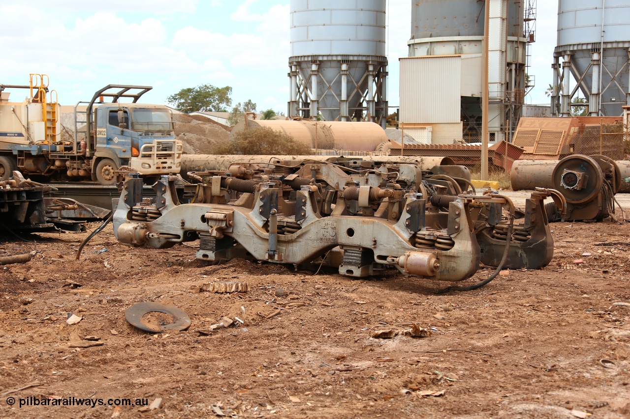 160128 00386
Wedgefield, Sims Metal yard, upturned bogie from recently scrapped new built Goninan CM39-8 unit 5632. Bogie is of a GE floating bolster design, serial 1-10-87.
Keywords: CM39-8;Goninan;GE;