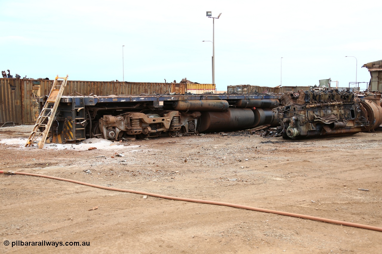 160128 00394
Wedgefield, Sims Metal yard, the ALCo remains of Goninan rebuild CM40-8ML (cabless, but cab fitted in 1996) 5664 serial 8412-09 / 94-155, the ALCo Hi-Ad bogies and fuel tanks of original ALCo M636 Comeng NSW built 5491 serial C6084-7.
Keywords: 5664;Goninan;GE;CM40-8ML;8412-09/94-155;rebuild;AE-Goodwin;ALCo;M636C;5469;G6047-1;