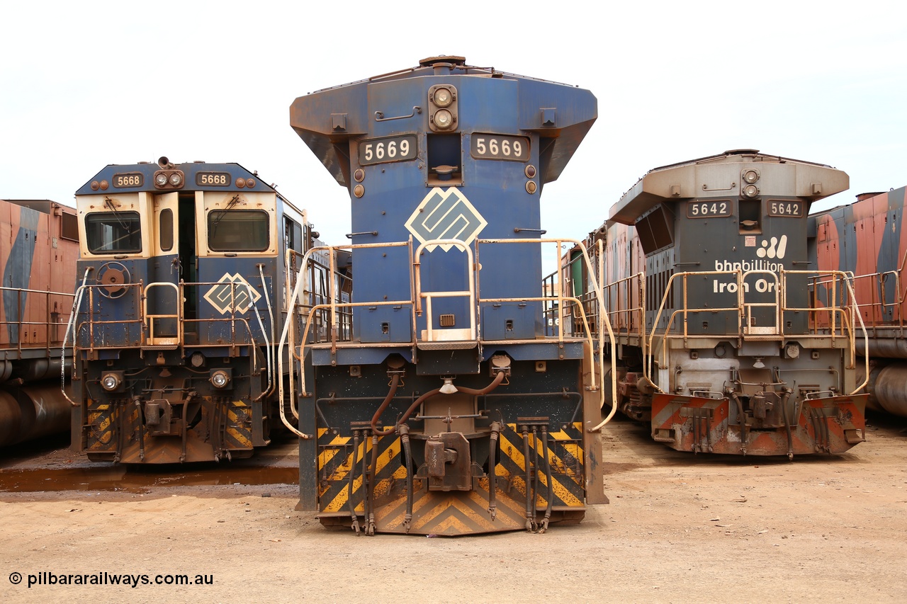 160128 00407
Wedgefield, Sims Metal Yard, rear view of Goninan rebuilt GE model CM40-8MEFI 5669 serial 8412-02, builders no. 95-160 flanked on the left by sister unit 5668 and on the right by older CM40-8M 5642. Note the newer rebuilds have marker lights while 42 has none but has a snow plough on the no. 2 end. Also note the roof access ladder rungs have been removed.
Keywords: 5669;Goninan;GE;CM40-8EFI;8412-02/95-160;rebuild;Comeng-NSW;ALCo;M636C;5486;C6084-2;