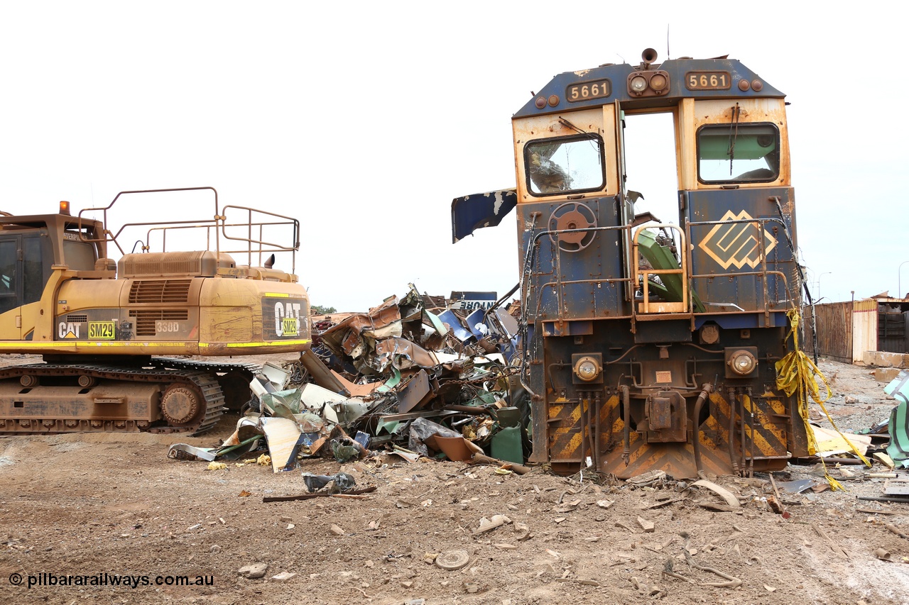 160128 00876
Wedgefield, Sims Metal Yard, the almost unmarked front of Goninan rebuilt GE model CM40-8M unit 5661, serial 8412-06, builders no. 94-152 is surrounded by the twisted scrap that earlier formed the rest of the locomotive.
Keywords: 5661;Goninan;GE;CM40-8M;8412-06/94-152;rebuild;Comeng-NSW;ALCo;M636C;5488;C6084-4;