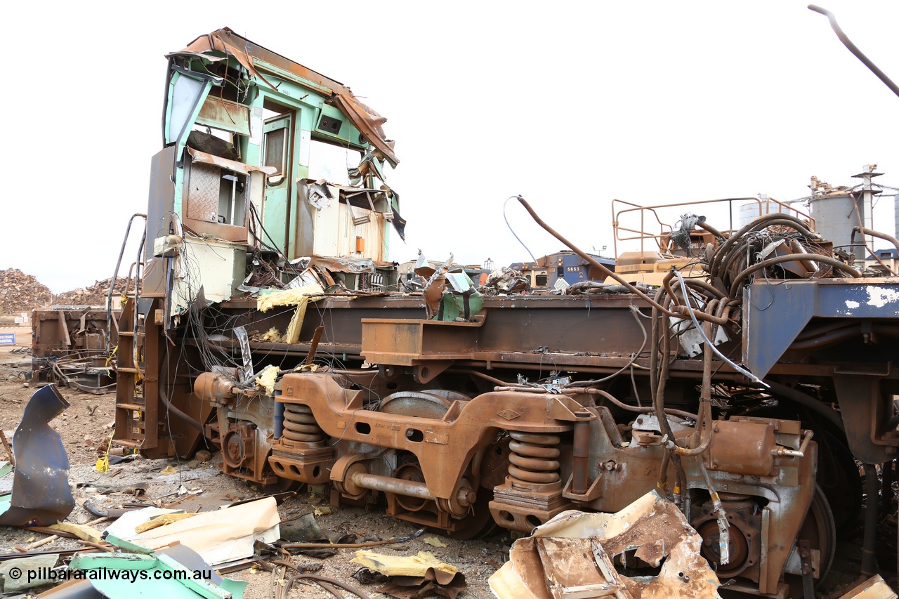 160128 00882
Wedgefield, Sims Metal Yard, view looking at the inside of the cab front wall and the ALCo Hi-Ad bogie shows the external coil secondary suspension.
Keywords: 5661;Goninan;GE;CM40-8M;8412-06/94-152;rebuild;Comeng-NSW;ALCo;M636C;5488;C6084-4;