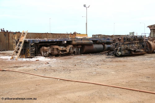 160128 00394
Wedgefield, Sims Metal yard, the ALCo remains of Goninan rebuild CM40-8ML (cabless, but cab fitted in 1996) 5664 serial 8412-09 / 94-155, the ALCo Hi-Ad bogies and fuel tanks of original ALCo M636 Comeng NSW built 5491 serial C6084-7.
Keywords: 5664;Goninan;GE;CM40-8ML;8412-09/94-155;rebuild;AE-Goodwin;ALCo;M636C;5469;G6047-1;