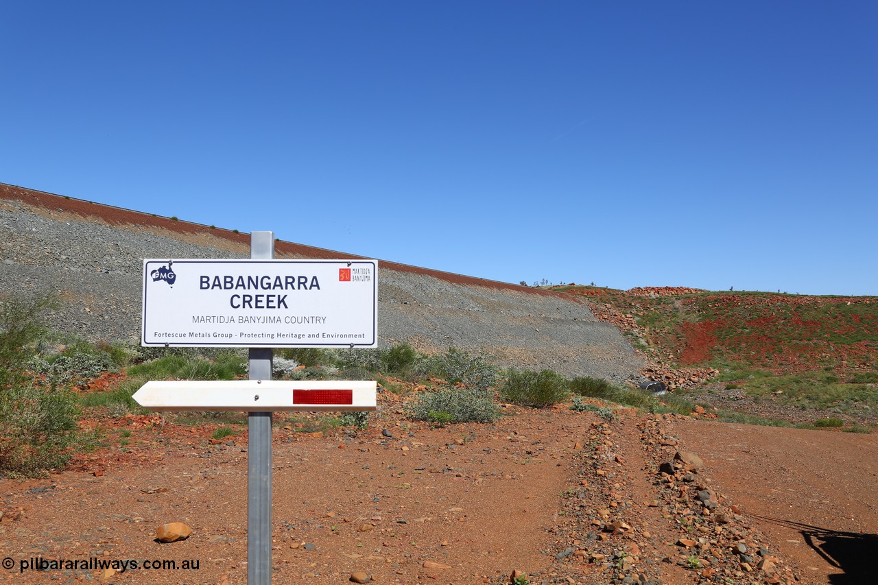 150505 7937
FMG Solomon Line, looking east across earth fill abutment with culverts, sign indicating Babangarra Creek. Geodata: [url=https://goo.gl/maps/wRgVPLkhjnw] -22.0522533 118.7402133 [/url].
