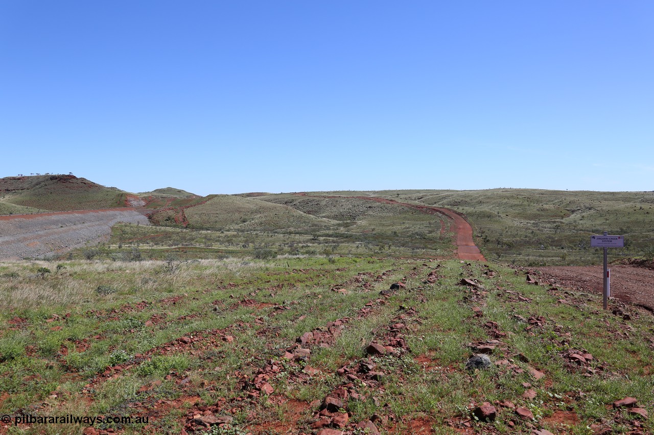 150505 7942
FMG Solomon Line, looking east, earth fill abutment embankment for rail line, Jingarri Creek, expanded view from 7940, shows access road. Geodata: [url=https://goo.gl/maps/PCJ1fDRmspu] -22.0545750 118.7278517 [/url].
