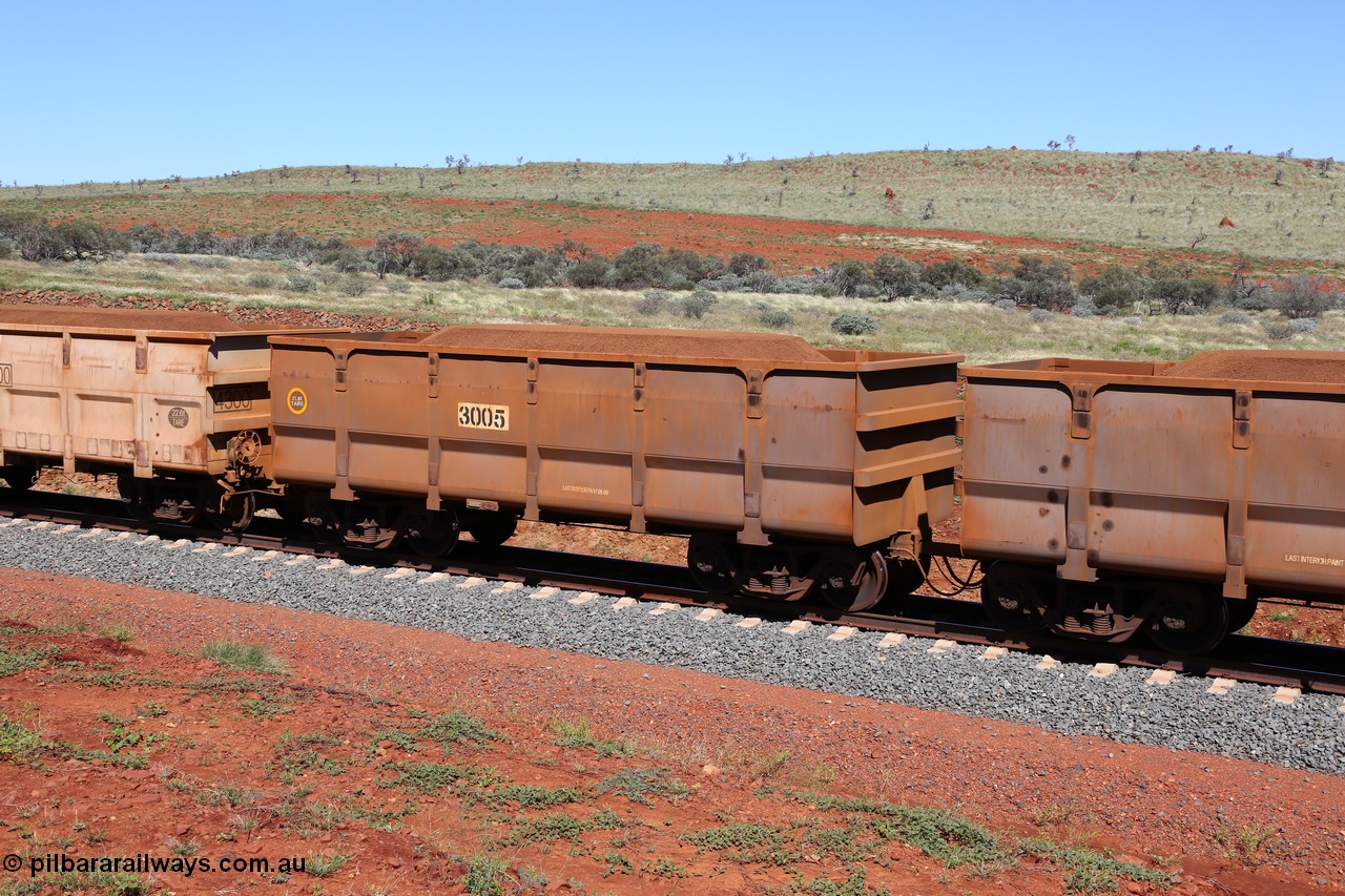 150505 7978
FMG Solomon Line, waggon 3005, tare weight of 21.8 tonnes, yellow circle indicates rotary coupling, built in 2009 by CSR Yangtze Rolling Stock Co. Ltd, loaded with fines ore. Geodata: [url=https://goo.gl/maps/kUsNTBpDLFk] -22.0187350 118.5850917 [/url].
Keywords: CSR-Yangtze-Rolling-Stock-Co-China;