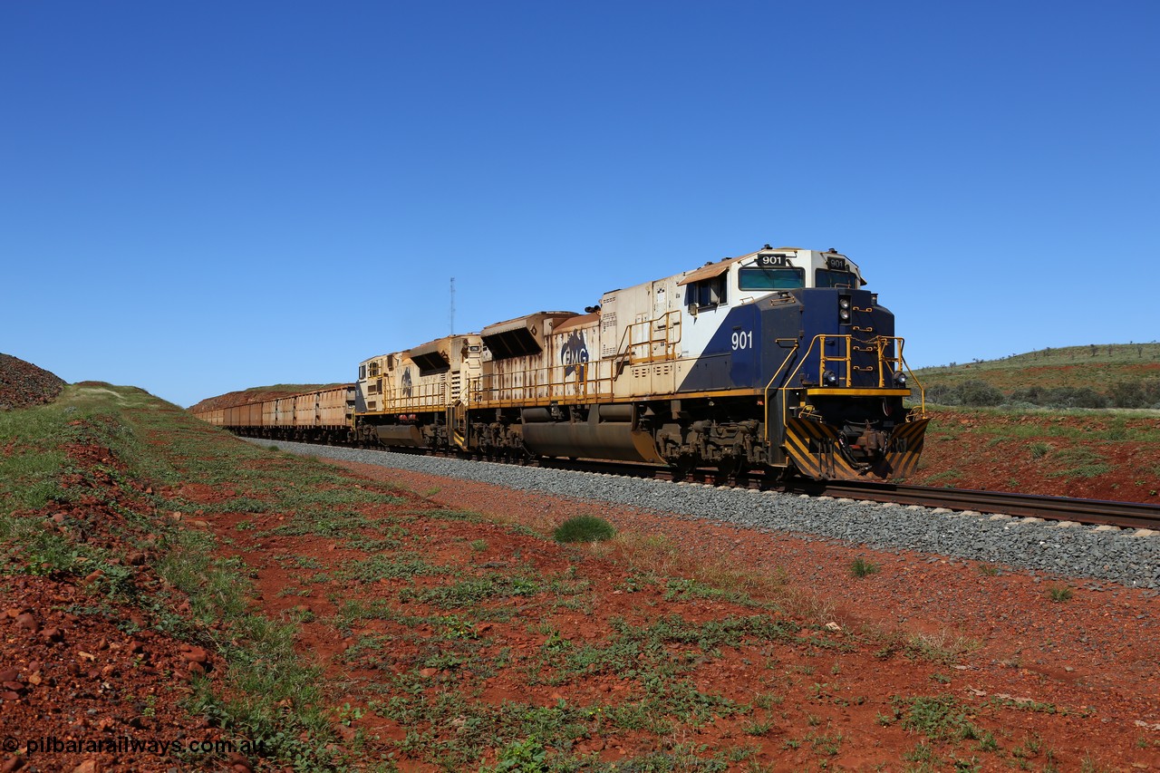 150505 7988
FMG Solomon Line, bank engines Progress Rail EMD SD70ACe/LCi unit 716 serial 20118693-008 and EMD SD90MAC unit 901 serial 976833-1, this unit has been repowered with an 16-710G3 prime mover, at the 227 km as they bank the loaded train upgrade into the cutting, the train speed is now increasing as the front of the train has topped the grade. Geodata: [url=https://goo.gl/maps/gSzXJkmY3ux] -22.0187117 118.5850933 [/url].
Keywords: FMG-716;Progress-Rail-Muncie-USA;EMD;SD70ACe/LCi;FMG-901;SD90MAC-H2;