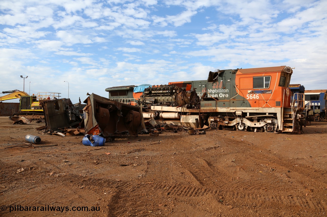 150522 8160
Wedgefield, Sims Metal yard, the first batch of BHP Billiton Dash 8 locos to be scrapped, 5646 serial 8244-11/92-135 one of a pair of new Goninan WA built CM40-8 units has already had most of the hood removed and the V16 7FDL prime mover is visible.
Keywords: 5646;Goninan;GE;CM40-8;8244-11/92-135;