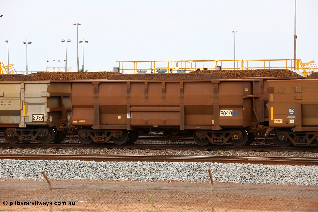 150523 8245
Nelson Point Yard, loaded ore waggon 9040, a Golynx style waggon built by Goninan in 2005 with asset number of 203485 out of 5Cr12Ti stainless steel which does away with the need to paint the waggon interiors to prevent wear.
Keywords: Goninan-Golynx;BHP-ore-waggon;