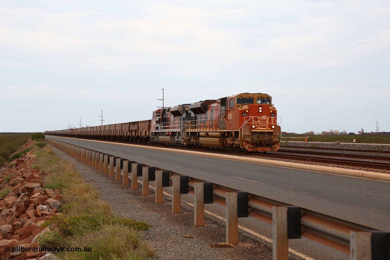 150523 8265
Finucane Island, empty train heading back to Boodarie behind Progress Rail EMD SD70ACe unit 4379 serial 20108424-006 and a newly arrived and named sibling 4474 'Raymond White' serial 20148001-007. Geodata: [url=https://goo.gl/maps/3oDrc9JAS762] -20.3341700 118.5504083 [/url].
Keywords: 4379;Progress-Rail-Muncie-USA;EMD;SD70ACe;20108424-006;