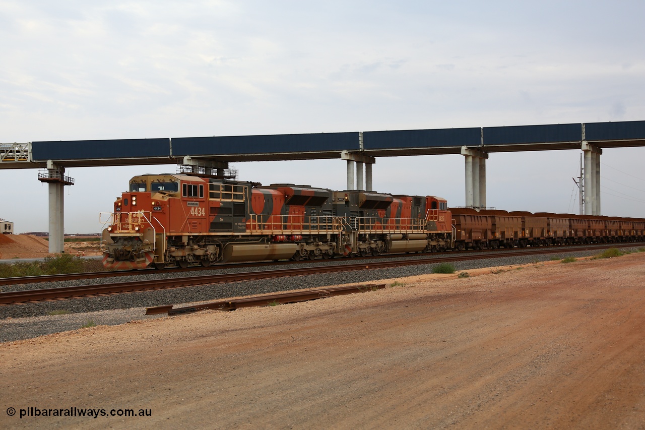 150523 8274
Finucane Island, loaded train arriving at the Island behind Progress Rail SD70ACe unit 4434 'Koombana' serial 20128866-003 and same batch sibling 4435 serial 20128866-004 train is running under new Roy Hill conveyor and road bridge. Geodata: [url=https://goo.gl/maps/c1KCYY62oRx] -20.3363383 118.5497850 [/url].
Keywords: 4434;Progress-Rail-Muncie-USA;EMD;SD70ACe/LCi;20128866-003;