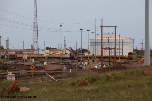 150523 8230
Nelson Point Yard, wide view across BI-LO Crossing, a throw back to days that the supermarket was in fact a BI-LO, well before the current Woolworths, and Action before that. Dash 8 units in the yard, on the 5642 with the Steel Train and 5648 with another on a rake of index waggons.
