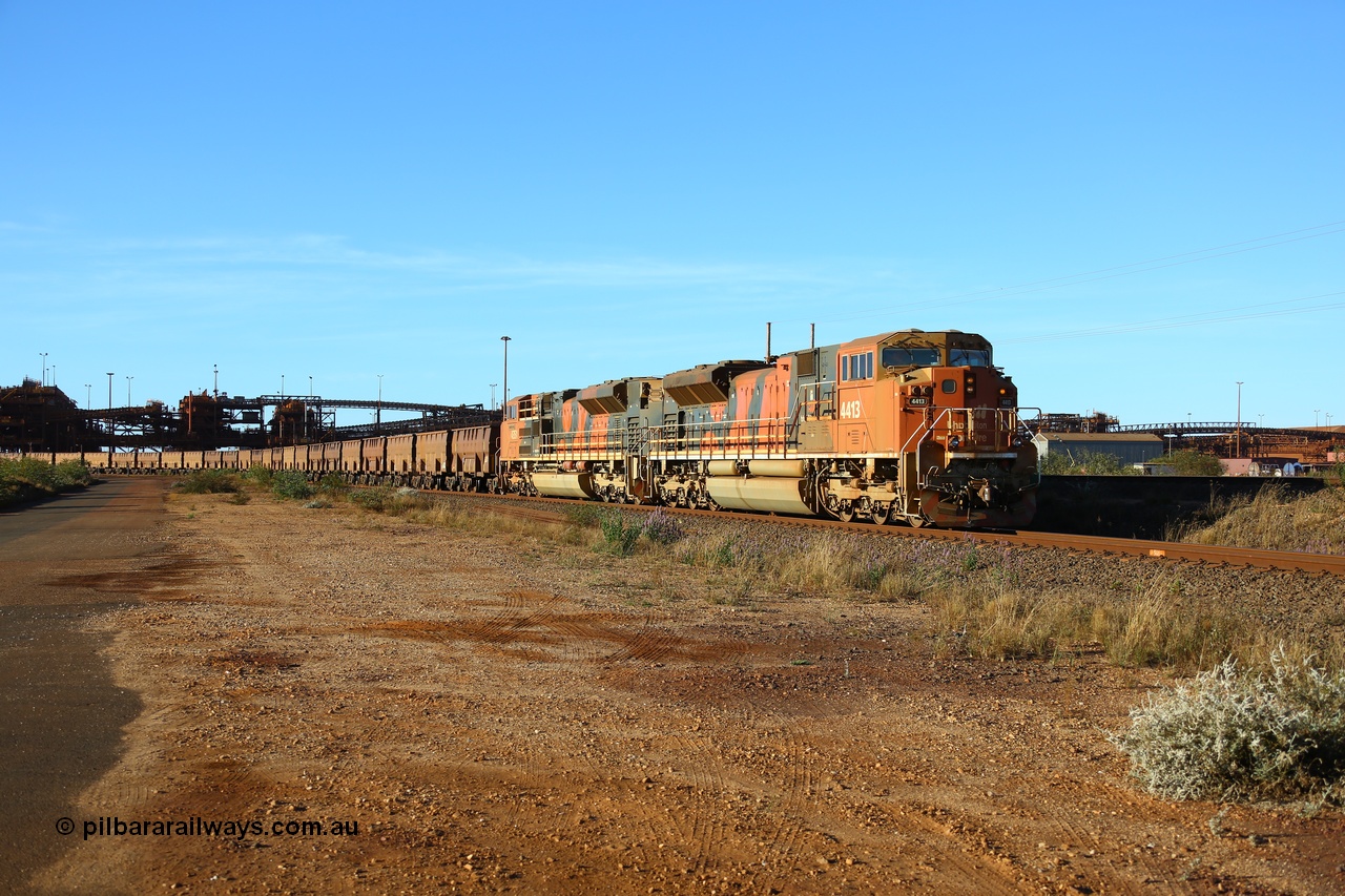 170726 9447
Finucane Island, running around the balloon loop with an empty BHP iron ore train behind Progress Rail Muncie USA built SD70ACe/LCi unit 4413 serial 20118685-011 with a sister unit as they head back to be provisioned at Boodarie. 26th July 2017.
Keywords: 4413;Progress-Rail-Muncie-USA;EMD;SD70ACe;20118685-011;