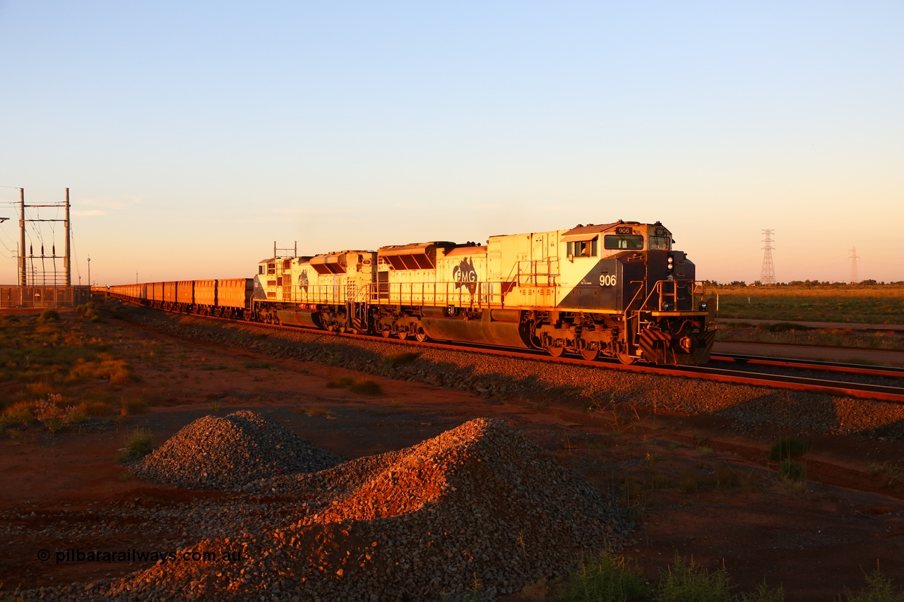 170726 9504
Boodarie, an empty train departs the unloader balloon loops and heads back to Thomas Yard behind NS Juniata Shops USA rebuild EMD SD9043MAC unit 906 serial 976833-09, which was originally a Union Pacific SD90MAC-H2 #8530 prior to rebuild, leads an SD70ACe/LCi unit in the last rays of daylight. 26th July 2017.
Keywords: FMG-906;NS-Juniata-Shops;EMD;SD9043MAC;976833-9;