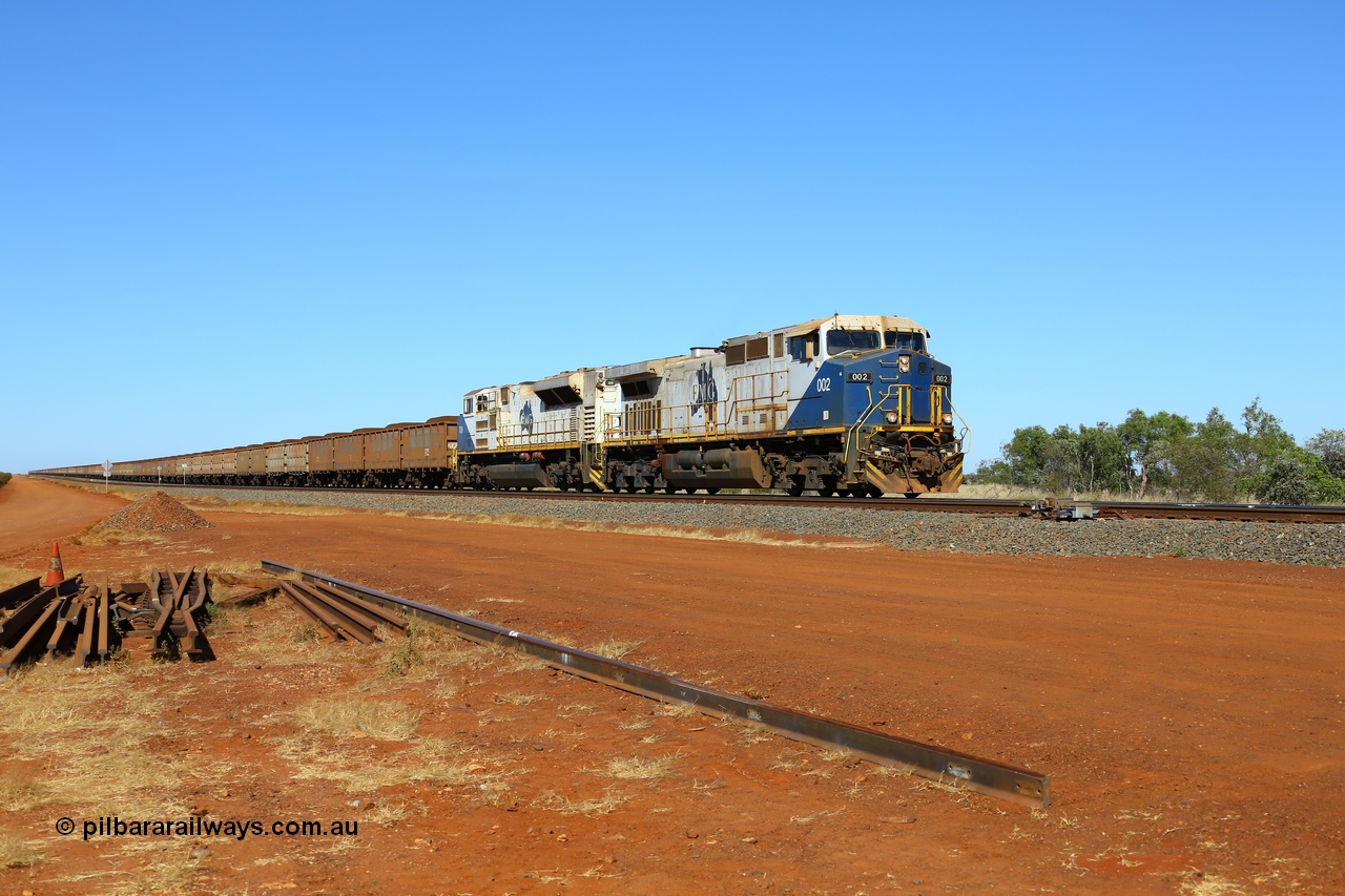 170727 9535
Canning, the north end of a duplicated section sees loaded FMG iron ore train heading to the port behind General Electric built Dash 9-44CW unit 002 serial 57095 and an EMD SD70ACe/LCi unit. [url=https://goo.gl/maps/BiSnsmH1cxw]GeoData[/url].
Keywords: FMG-002;58179;GE;Dash-9-44CW;