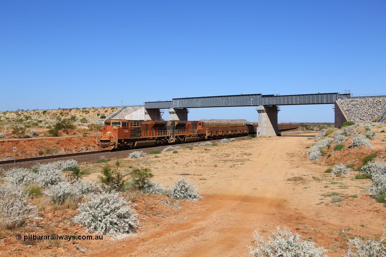 170727 9620
Woodstock Siding, a loaded BHP iron ore train passes under the Roy Hill overpass behind Progress Rail Muncie USA built EMD SD70ACe/LCi unit 4466 serial 20138907-017 and sister 4367. 27th July 2017. [url=https://goo.gl/maps/peEKeGz9sKS2]GeoData[/url].
Keywords: 4466;Progress-Rail-Muncie-USA;EMD;SD70ACe/CLi;20138907-017;