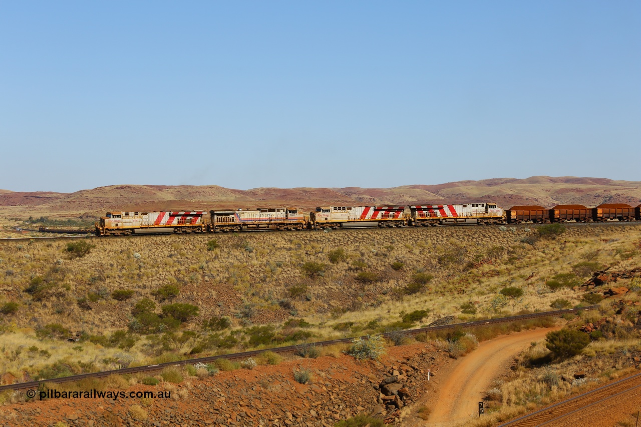 170728 09895
Western Creek, the disabled Mesa A train gets underway with relief power from General Electric built ES44DCi unit 8137 serial 59140 and Dash 9-44CW unit 7082 as the operate the train with the two ES44ACi units isolated. An empty train can be seen climbing the grade up through Emu. 28th July 2017. [url=https://goo.gl/maps/vvUWXEgppNM2]GeoData[/url].
Keywords: 8137;59140;GE;ES44DCi;