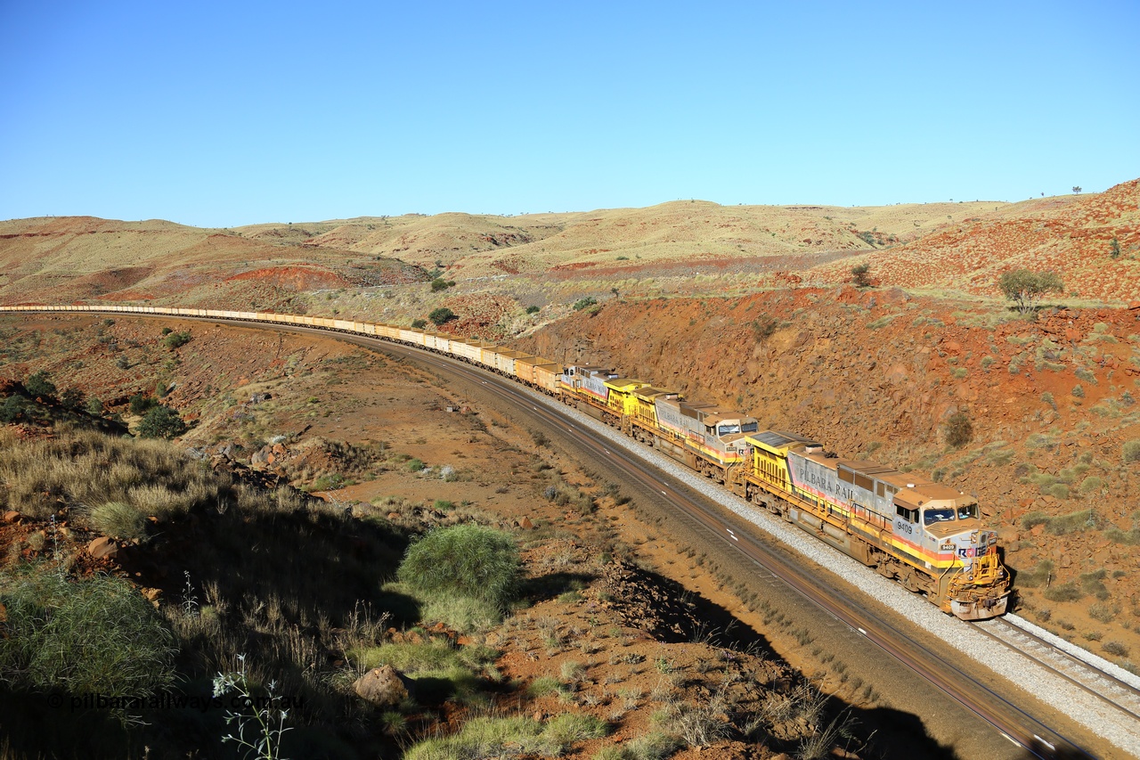 170728 09974
Benson Falls, 91 km curve, an empty train blasts up the steep grade behind a triple all General Electric built Dash 9-44CW unit power of 9409 serial 54159 and 9408 both in Pilbara Rail with Robe reporting marks, and 7060 in Pilbara Iron with HI reporting marks. 28th July 2017. [url=https://goo.gl/maps/5Krz1ULwNex]GeoData[/url].
Keywords: 9409;54159;GE;Dash-9-44CW;