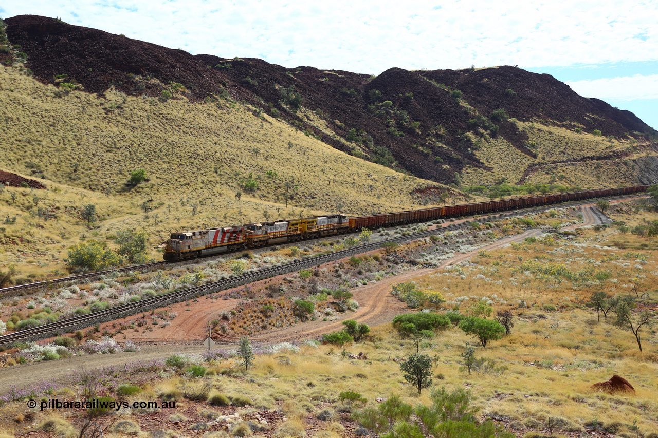 170729 0135
Green Pool, an empty Rio Tinto iron ore train runs along the Lyndon River behind General Electric built ES44DCi unit 8184 serial 60782 and a pair of Pilbara Iron liveried with HI reporting marks General Electric built Dash 9-44CW units 7045 and 7049. 29th July 2017. [url=https://goo.gl/maps/WgjGi8LaftF2]GeoData[/url].
Keywords: 8184;60782;GE;ES44DCi;