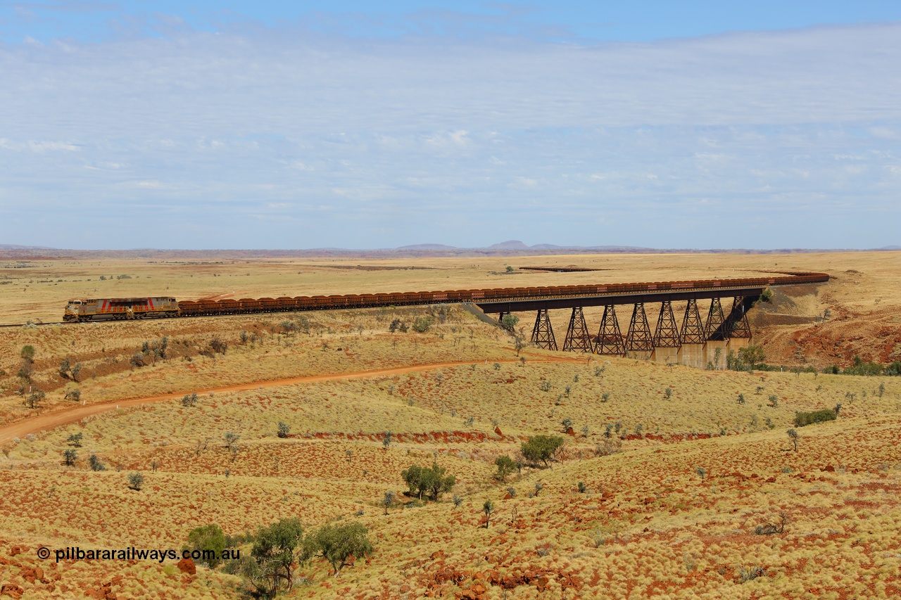 170729 0172
Fortescue River Bridge on the Robe River line at the 115.8 km, a loaded Deepdale train heading for Cape Lambert behind the standard motive power for this line, double General Electric built ES44ACi units, 9114 serial 62545 and sister unit 9101 serial 61939 run over the largest rail bridge in the Pilbara. 29th July 2017. [url=https://goo.gl/maps/urXsiFNXfiz]GeoData[/url].
Keywords: 9114;62545;GE;ES44ACi;