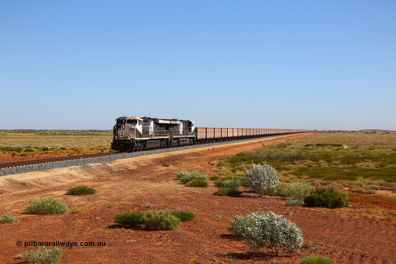 170730 0490
Indee, an empty Roy Hill train rounds the curve at the Indee Rd grade crossing at the 53.3 km behind General Electric built double ES44ACi units RHA 1008 serial 62580 and RHA 1018 and 112 waggons, then the mid-train unit and then another 112 waggons. 30th July 2017. [url=https://goo.gl/maps/2CQfE4RUoWn]GeoData[/url].
Keywords: RHA-class;RHA1008;62580;GE;ES44ACi;