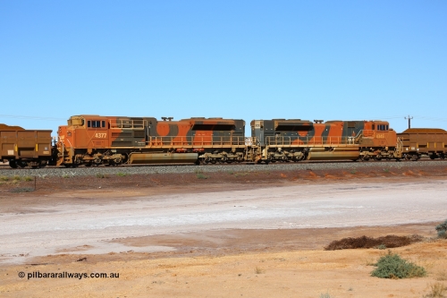 170726 9430
Redbank, a loaded BHP iron ore train from Yandi arrives into Nelson Point yard on the west mainline with mid-train remote units built by Progress Rail as SD70ACe unit 4377 serial 20108424-004 leading an SD70ACe/LC unit 4345. 26th July 2017.
Keywords: 4377;Progress-Rail-Muncie-USA;EMD;SD70ACe;20108424-004;
