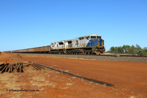 170727 9535
Canning, the north end of a duplicated section sees loaded FMG iron ore train heading to the port behind General Electric built Dash 9-44CW unit 002 serial 57095 and an EMD SD70ACe/LCi unit. [url=https://goo.gl/maps/BiSnsmH1cxw]GeoData[/url].
Keywords: FMG-002;GE;Dash-9-44CW;58179;