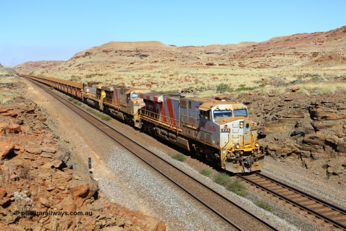 170728 09805
Emu Siding, a loaded train rolls down grade at the 81 km West Mainline behind Rio Tinto stripe liveried General Electric built ES44DCi unit 8144 serial 58725 and sister and final unit 8199 and a Dash 9-44CW stablemate 9403. July 28, 2017. [url=https://goo.gl/maps/h82NfgWLwnq]GeoData[/url].
Keywords: 8144;GE;ES44DCi;58725;