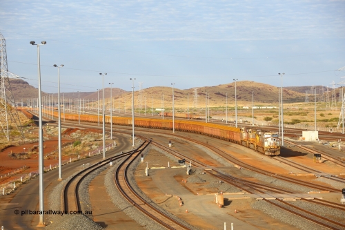 170729 0076
Cape Lambert South yard, a loaded train heads towards car dumper 5 behind General Electric built ES44DCi unit 8103 serial 57999 in original Rio Tinto silver with a Dash 9-44CW unit 7076 and sister ES44DCi unit 8129 in the later Rio Tinto stripe livery. July 29, 2017. [url=https://goo.gl/maps/zQ62JNaib6J2]GeoData[/url].
Keywords: 8103;GE;ES44DCi;57999;