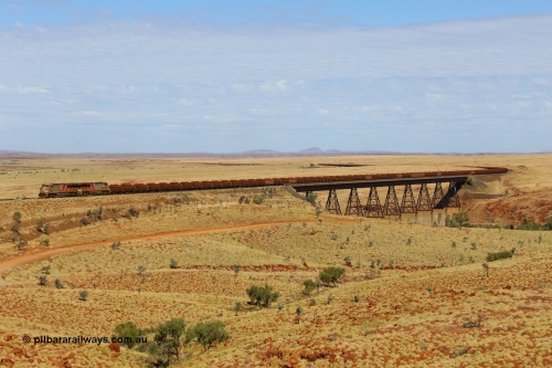 170729 0172
Fortescue River Bridge on the Robe River line at the 115.8 km, a loaded Deepdale train heading for Cape Lambert behind the standard motive power for this line, double General Electric built ES44ACi units, 9114 serial 62545 and sister unit 9101 serial 61939 run over the largest rail bridge in the Pilbara. July 29, 2017. [url=https://goo.gl/maps/urXsiFNXfiz]GeoData[/url].
Keywords: 9114;GE;ES44ACi;62545;