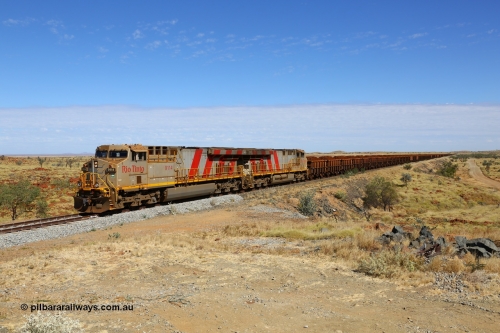 170729 0191
109 km on the former Robe River line a loaded Deepdale train heading for Cape Lambert behind the standard Rio Tinto motive power for this line, double General Electric built ES44ACi units, 9114 serial 62545 and sister unit 9101 serial 61939 drag upgrade. July 29, 2017. [url=https://goo.gl/maps/VnKyNqFvb7J2]GeoData[/url].
Keywords: 9114;GE;ES44ACi;62545;