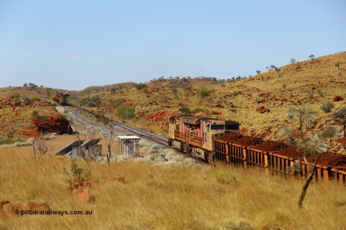 170729 0289
Maitland Siding on the former Robe River line a loaded Deepdale train heading for Cape Lambert behind the standard Rio Tinto motive power for this line, double General Electric built ES44ACi units, 9114 serial 62545 and sister unit 9101 serial 61939 will stay on the main as an empty train waits on the passing siding. July 29, 2017. [url=https://goo.gl/maps/CNgRRqCioHp]GeoData[/url].
Keywords: 9114;GE;ES44ACi;62545;