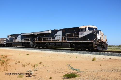 170730 0513
Indee, a loaded Roy Hill train runs along at the 71 km heading to the port behind General Electric built ES44ACi units RHA 1010 serial 62582 and RHA 1004 with 224 waggons and a mid-train remote in the middle. 30th July 2017. [url=https://goo.gl/maps/4pcTwmi7BmF2]GeoData[/url].
Keywords: RHA-class;RHA1010;GE;ES44ACi;62582;