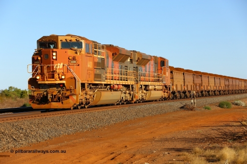 170730 0528
Indee, at the 55 km on the BHP line a loaded train from Yandi is heading north behind Progress Rail Muncie USA built SD70ACe/LCi unit 4400 serial 20118575-010 with second unit 4348. 30th July 2017. [url=https://goo.gl/maps/wGgtxogq8ck]GeoData[/url].
Keywords: 4400;Progress-Rail-Muncie-USA;EMD;SD70ACe/LCi;20118575-010;