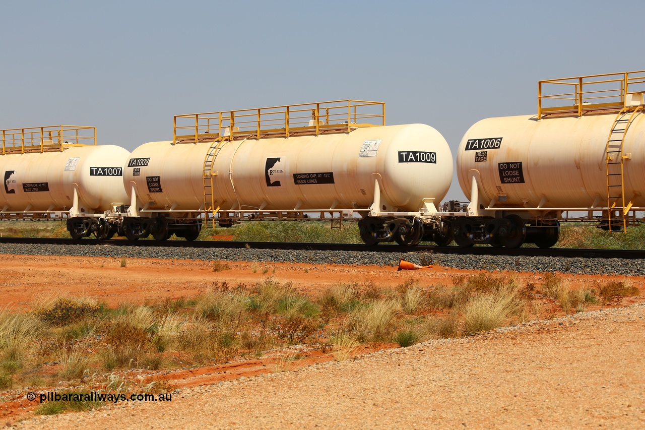 170915 0713
At the 18.2 km as part of the empty Roy Hill fuel train, TA type diesel fuel tank waggon TA 1009 built by CSR Yangtze Rolling Stock Co China with a capacity of 96000 litres. 15th September 2017. [url=https://goo.gl/maps/DR61N4rDVZy]View map here[/url].
Keywords: TA-Type;TA1009;CSR-Yangtze-Rolling-Stock-Co-China;Roy-Hill-Tank-Waggon;