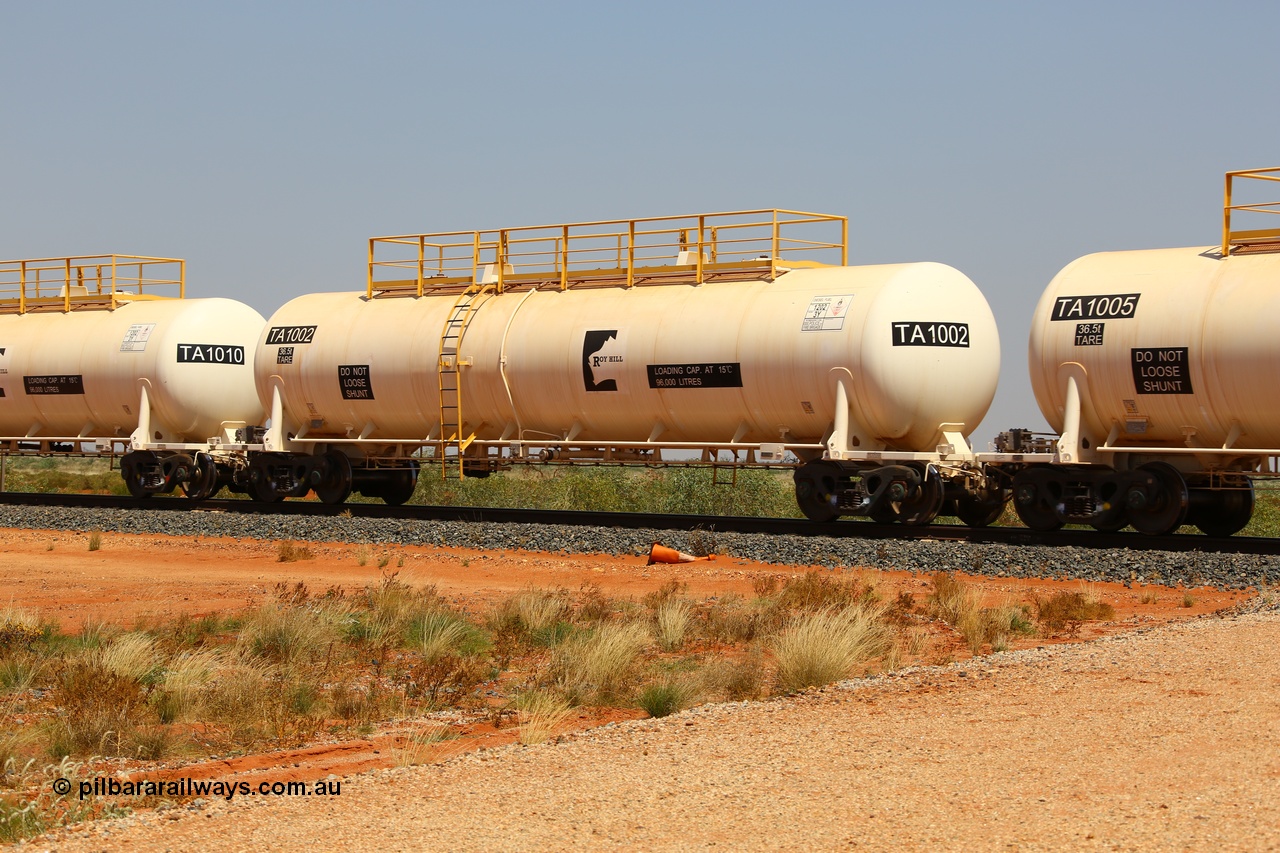 170915 0716
At the 18.2 km as part of the empty Roy Hill fuel train, TA type diesel fuel tank waggon TA 1002 built by CSR Yangtze Rolling Stock Co China with a capacity of 96000 litres. 15th September 2017. [url=https://goo.gl/maps/DR61N4rDVZy]View map here[/url].
Keywords: TA-Type;TA1002;CSR-Yangtze-Rolling-Stock-Co-China;Roy-Hill-Tank-Waggon;