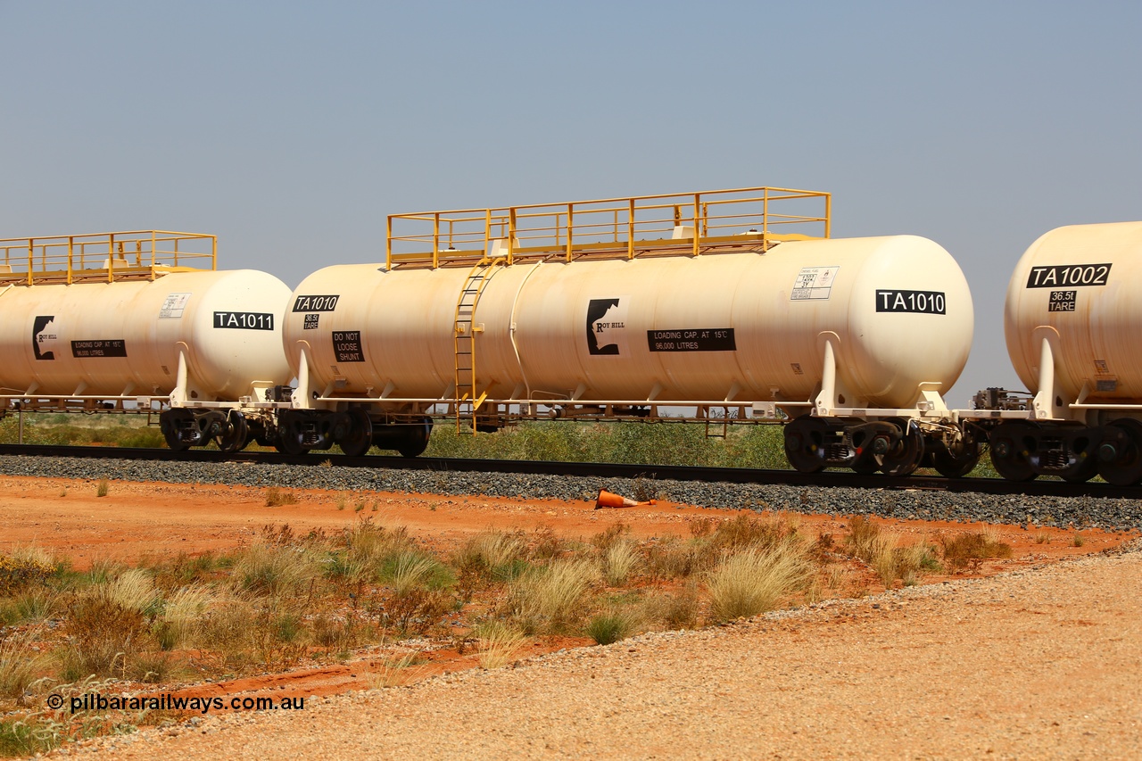 170915 0717
At the 18.2 km as part of the empty Roy Hill fuel train, TA type diesel fuel tank waggon TA 1010 built by CSR Yangtze Rolling Stock Co China with a capacity of 96000 litres. 15th September 2017. [url=https://goo.gl/maps/DR61N4rDVZy]View map here[/url].
Keywords: TA-Type;TA1010;CSR-Yangtze-Rolling-Stock-Co-China;Roy-Hill-Tank-Waggon;