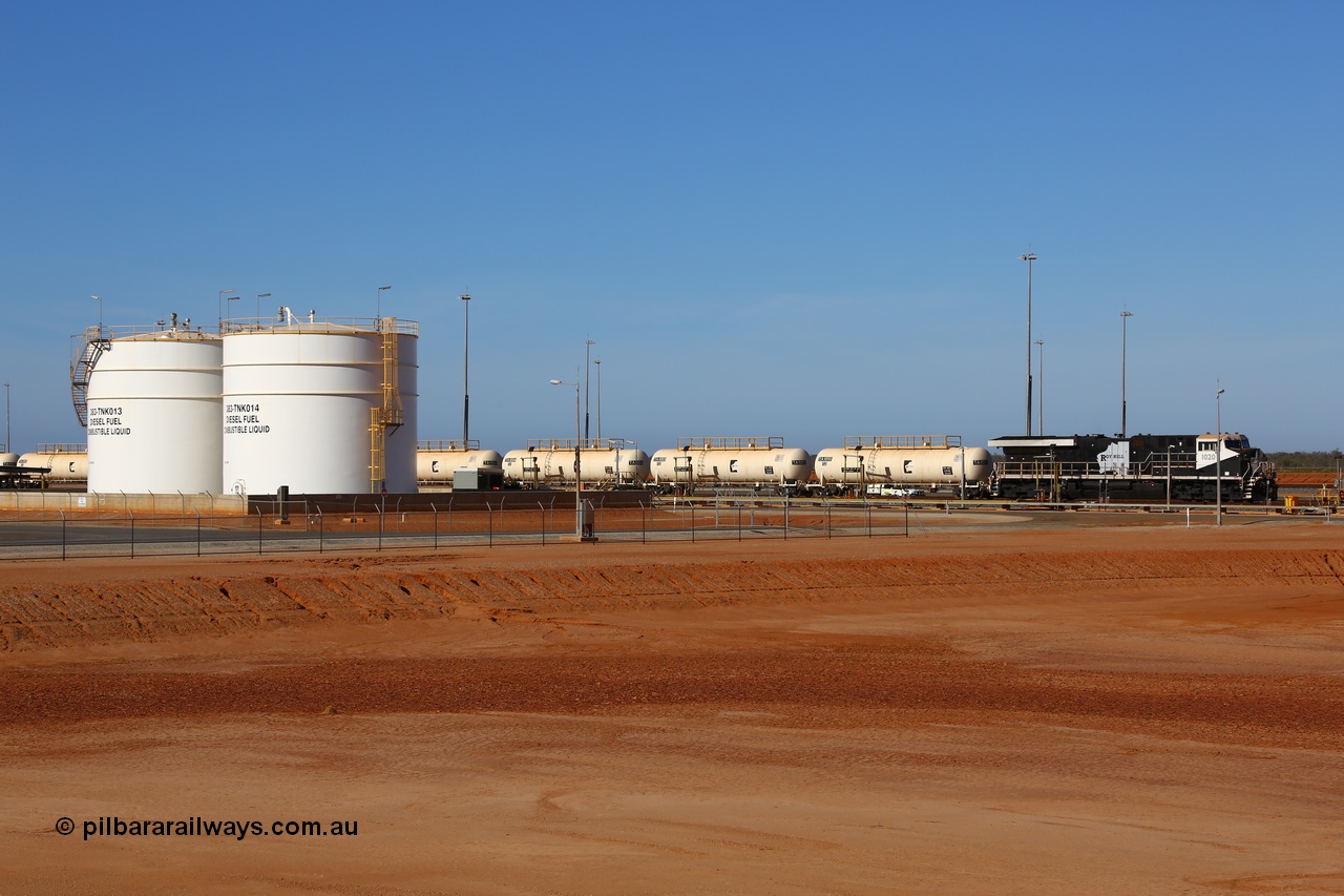 171018 0956
Tad Yard, overview of Roy Hill's fuel tanks and waggon loading gantry with a fuel train being loaded headed up by ES44ACi unit RHA 1020 serial number 64301 built in Erie Pennsylvania, USA by GE. 17th October 2018.
Keywords: RHA-class;RHA1020;GE;ES44ACi;64301;