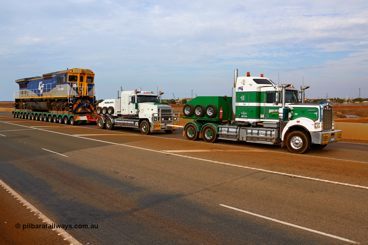 171204 1015r
Boodarie, BHP over bridge, CFCLA's Goninan ALCo to GE rebuild CM40-8M locomotive CD 4301 serial 2160-03 / 96-202, was originally Mt Newman Mining's Comeng NSW built ALCo M636 serial C6104-1 #5500, then Robe River unit 9410 before going to CFCLA in 2012. Be being delivered to Roy Hill's flash butt yard by Doolan's Heavy Haulage. 4th December 2017. [url=https://goo.gl/maps/qWvF1XtD3GN2]View map here[/url].
Keywords: CD-class;CD4301;CFCLA;Goninan;GE;CM40-8M;2160-03/96-202;rebuild;Comeng-NSW;ALCo;M636;9410;C6104-1;