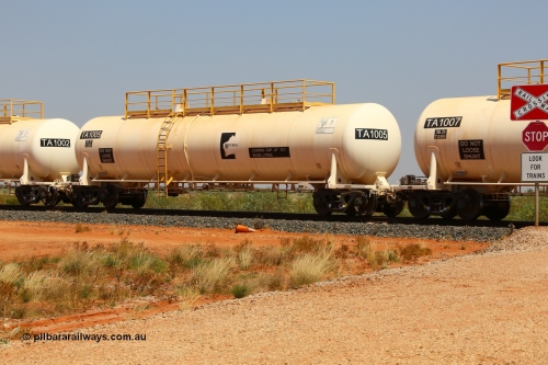 170915 0715
At the 18.2 km as part of the empty Roy Hill fuel train, TA type diesel fuel tank waggon TA 1005 built by CSR Yangtze Rolling Stock Co China with a capacity of 96000 litres. 15th September 2017. [url=https://goo.gl/maps/DR61N4rDVZy]View map here[/url].
Keywords: TA-Type;TA1005;CSR-Yangtze-Rolling-Stock-Co-China;Roy-Hill-Tank-Waggon;