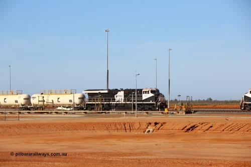 171018 0958
Tad Yard and Roy Hill's General Eclectic ES44ACi model unit RHA 1020 serial number 64301 idles away on the fuel train with tank waggons TA 1010 and TA 1003 which were built by China Southern Rail at their Zhuzhou works. This ES44ACi unit was built in February 2016 as Erie Pennsylvania, USA. October 18, 2017.
Keywords: RHA-class;RHA1020;GE;ES44ACi;64301;