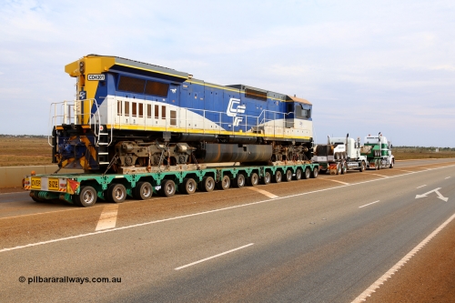 171204 1023r
Boodarie, BHP over bridge, CFCLA's Goninan ALCo to GE rebuild CM40-8M locomotive CD 4301 serial 2160-03 / 96-202, was originally Mt Newman Mining's Comeng NSW built ALCo M636 serial C6104-1 #5500, then Robe River unit 9410 before going to CFCLA in 2012. Be being delivered to Roy Hill's flash butt yard by Doolan's Heavy Haulage. 4th December 2017. [url=https://goo.gl/maps/qWvF1XtD3GN2]View map here[/url].
Keywords: CD-class;CD4301;CFCLA;Goninan;GE;CM40-8M;2160-03/96-202;rebuild;Comeng-NSW;ALCo;M636;9410;C6104-1;