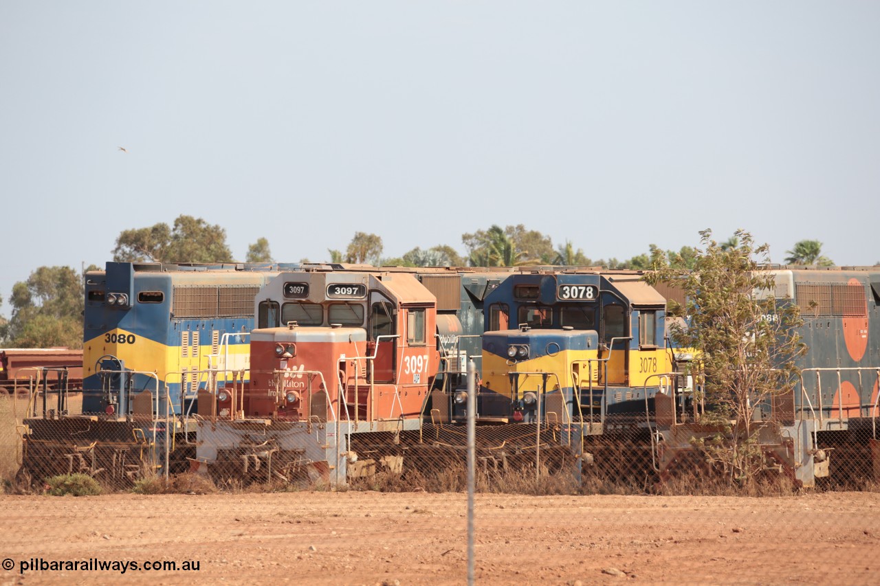 141025 5819
Wedgefield, WA, view from the new bypass road looking into the rear of Sell and Parker's metal recycling yard with former BHP Billiton Iron Ore EMD SD40 and SD40R model units lined up awaiting their fate, from left, SD40 3080, SD40R 3097, SD40 3078 and SD40R 3088.
Keywords: S+P;3080;3097;3078;EMD;SD40;SD40R;33674/7083-4;31569/7875-10;31503/7861-13;